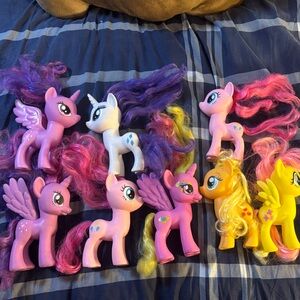 My Little Pony figures, likely from the G4 or G3.5 generations.